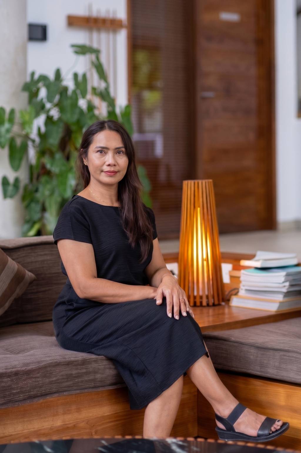 Ayu, Address Bali Villa Superhost, seated in the villa lounge
