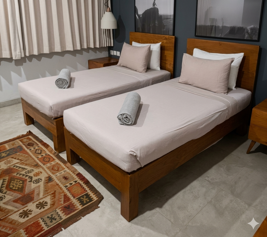 Twin beds setup showing extra sleeping arrangement at Address Bali Villa